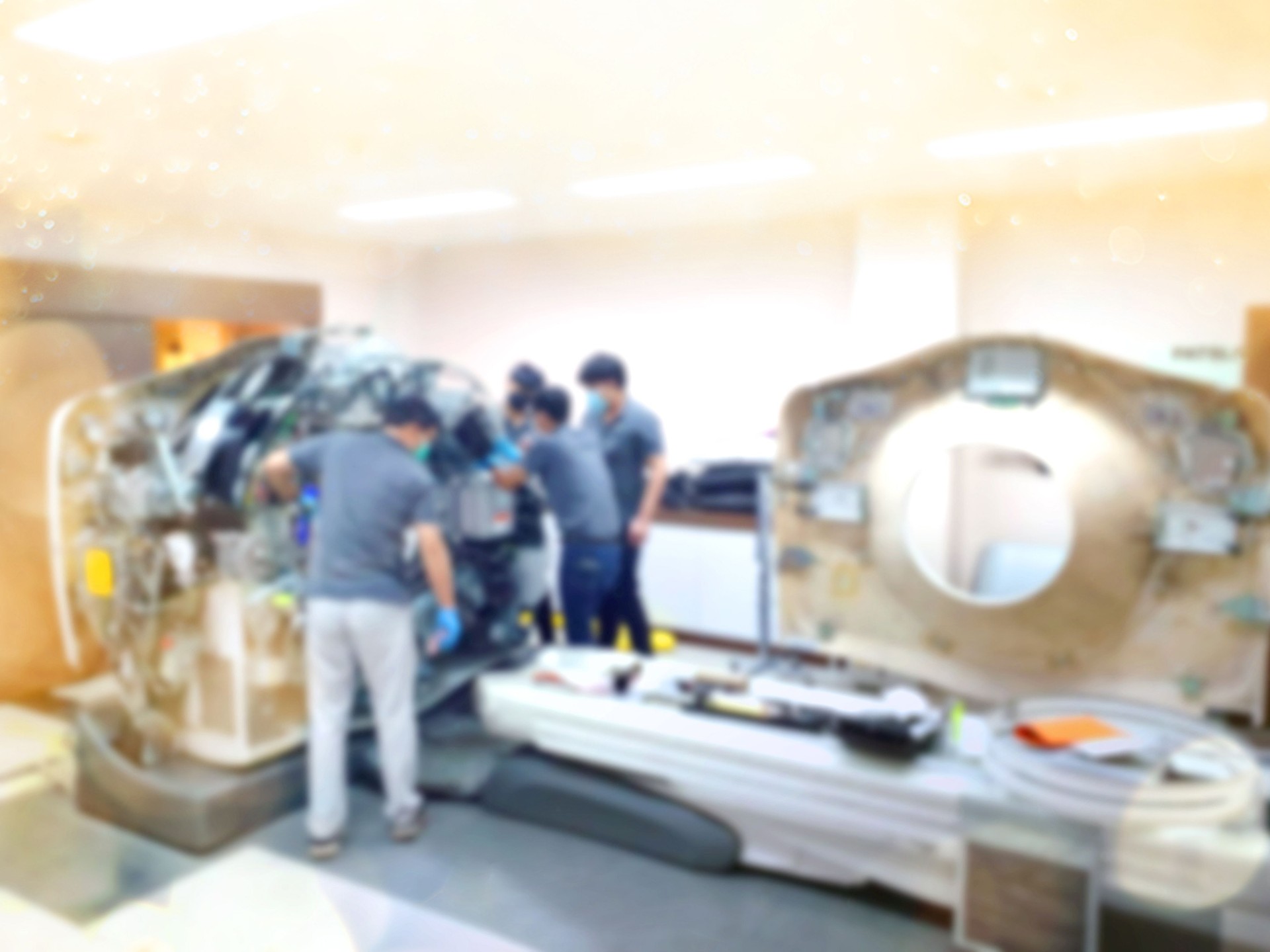 Maintenance engineer repairing and checking The  CT scanner.